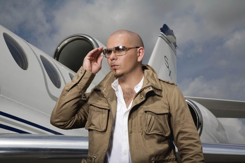Man in front of private jet