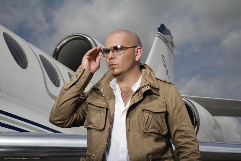 man in front of private jet