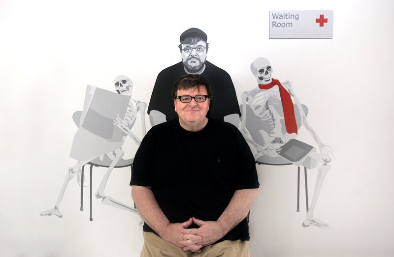Man in front of skeleton art