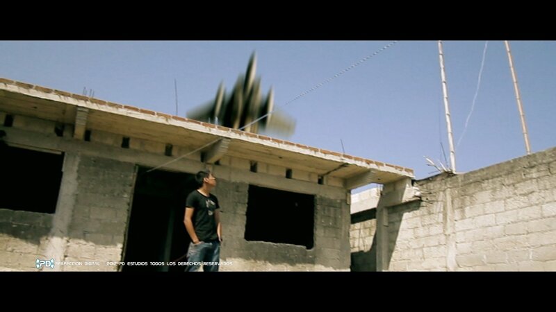 Man in front of unfinished building
