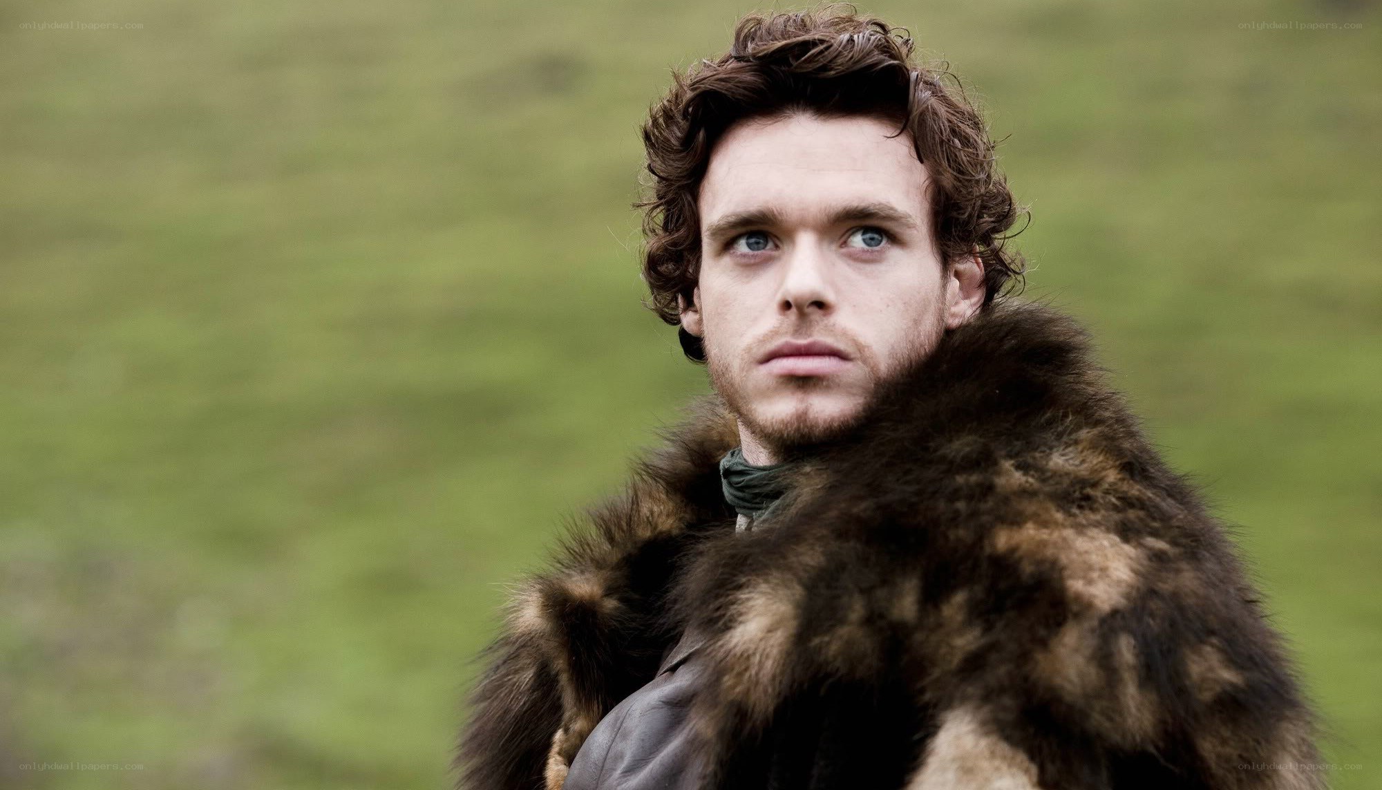 man in fur coat outdoors