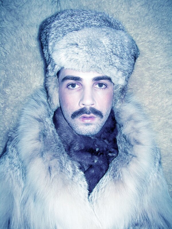 man in fur hat and coat