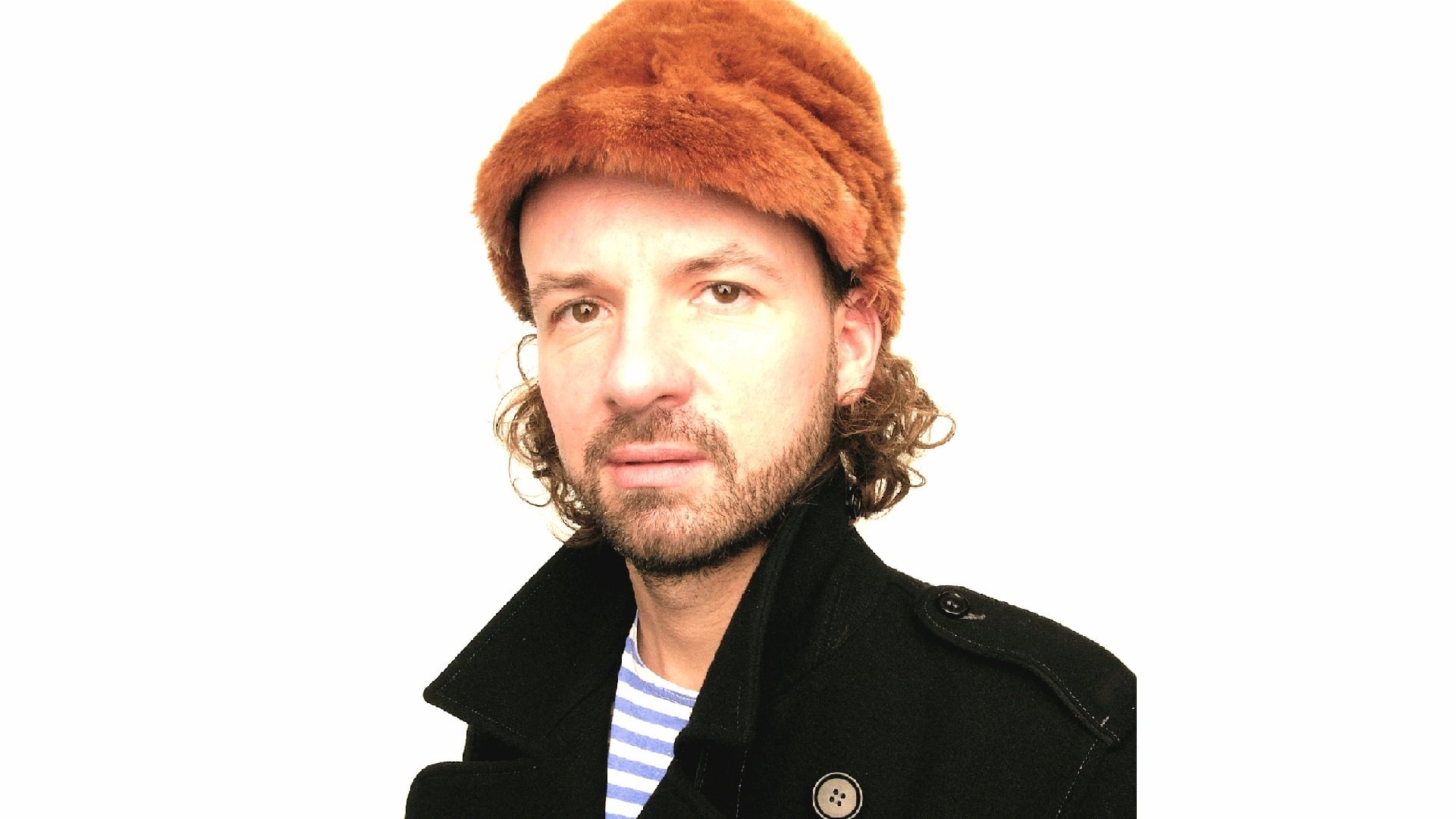 man in fur hat and coat