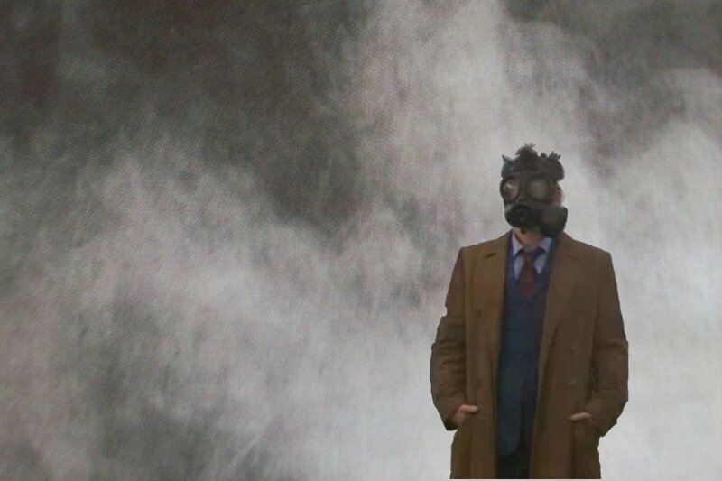 man in gas mask standing