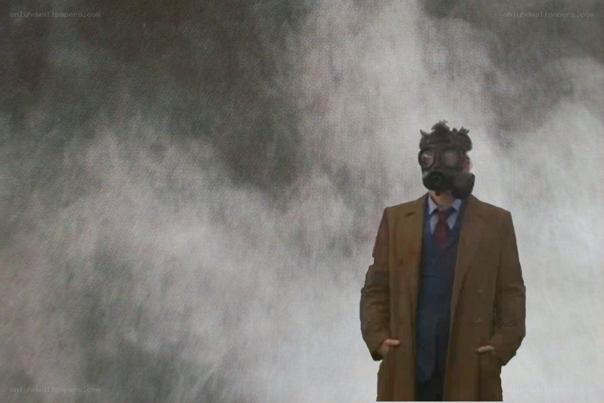 man in gas mask standing