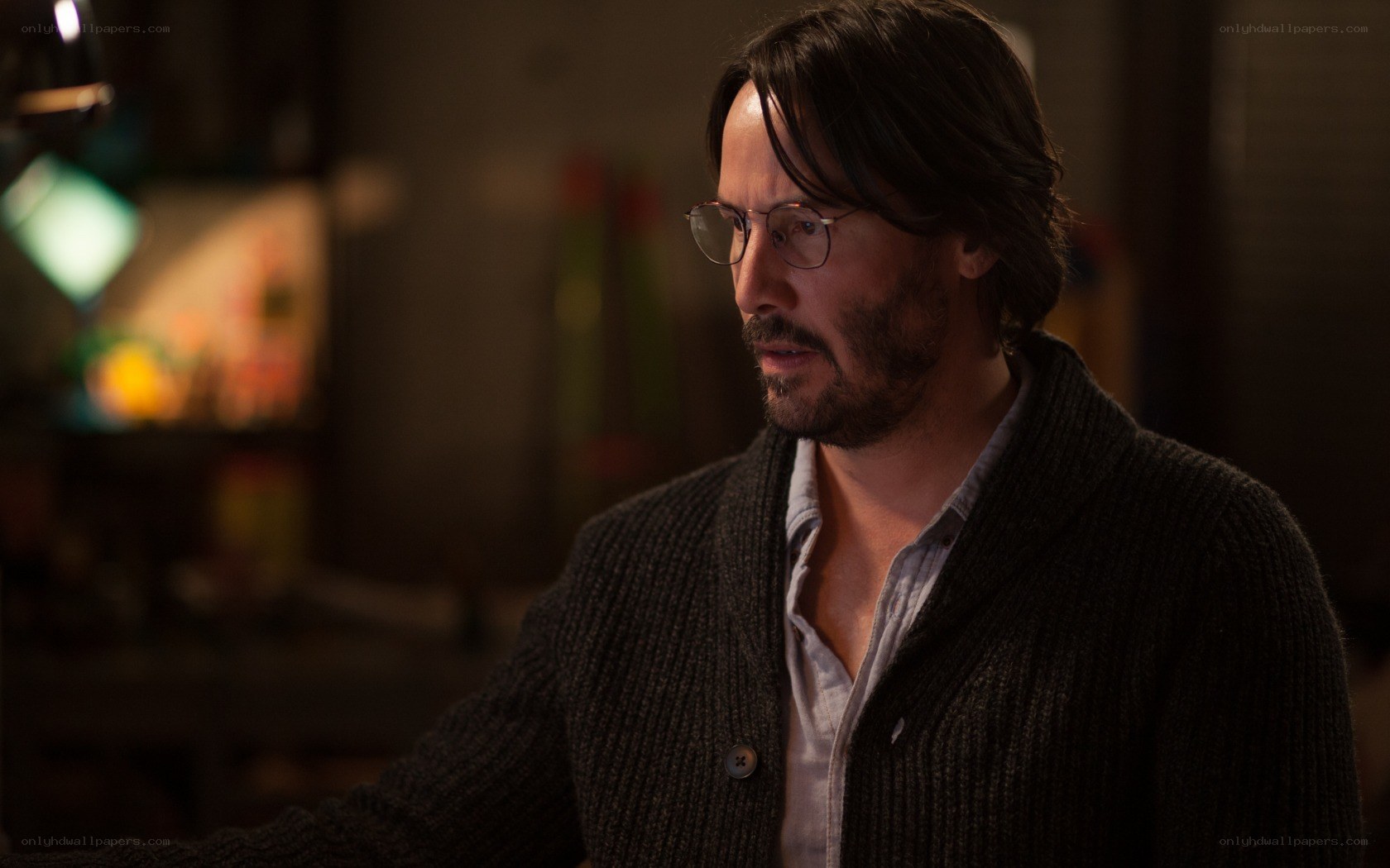 man in glasses and cardigan