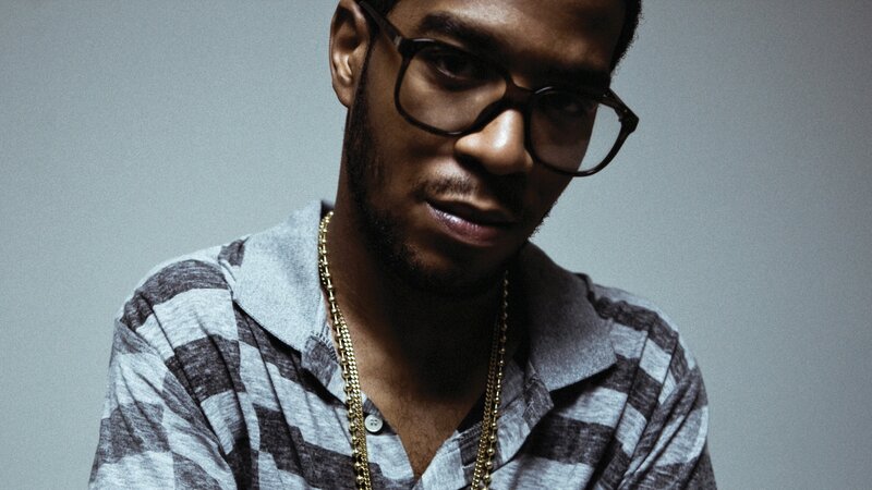 man in glasses and plaid shirt
