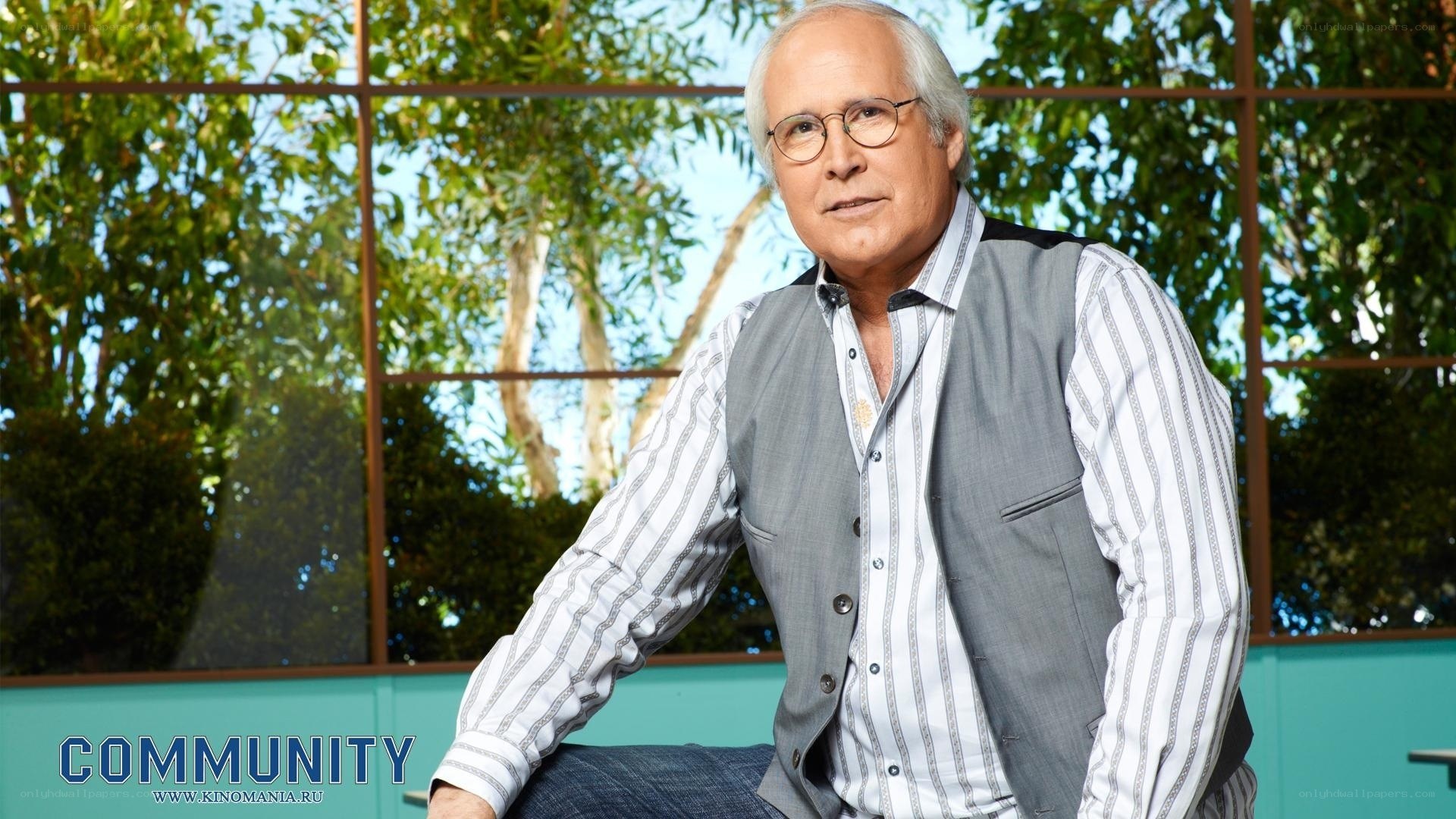 man in glasses and vest
