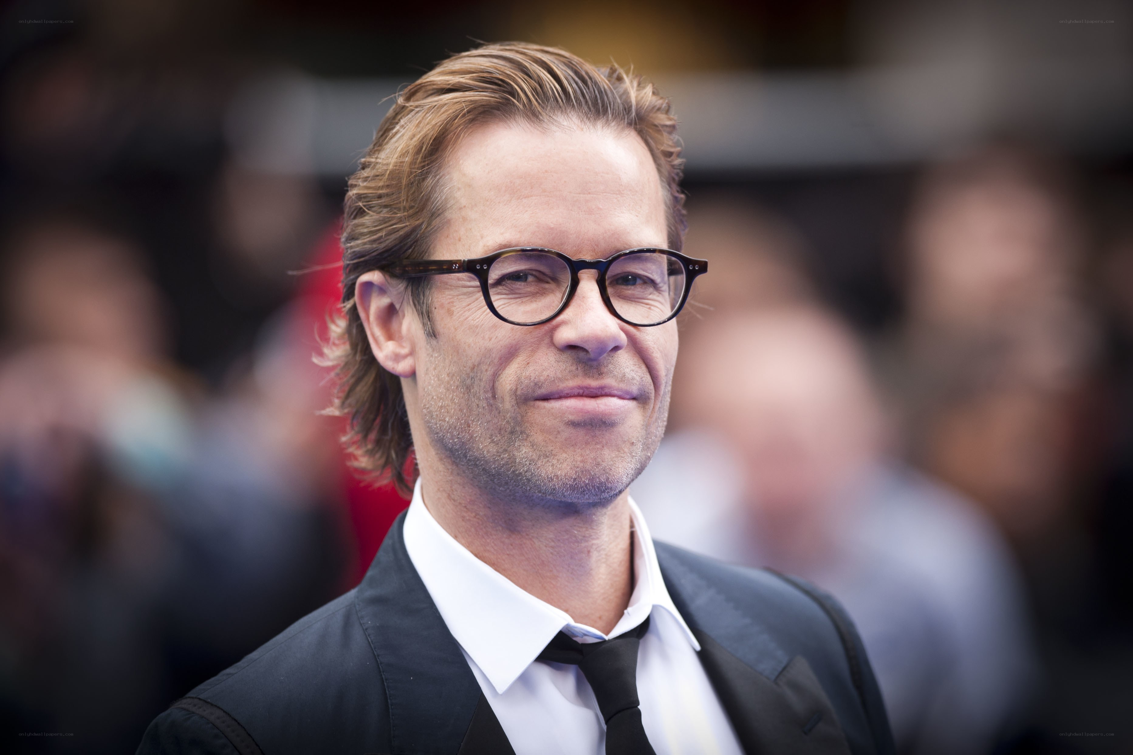 man in glasses at event