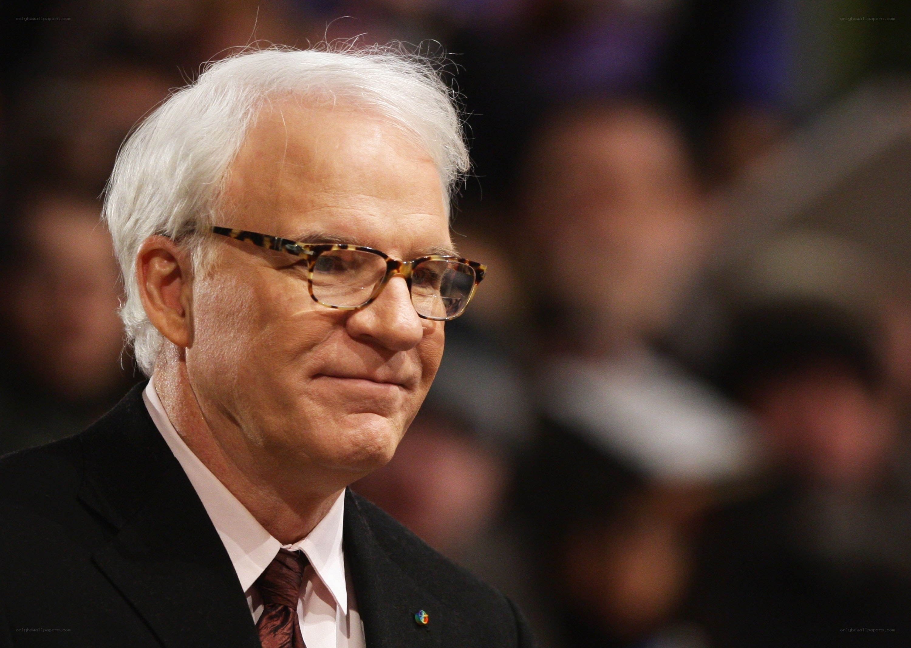 man in glasses at event