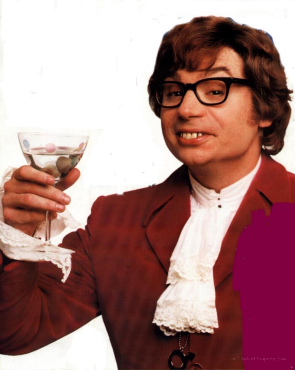 Man in glasses holding a martini