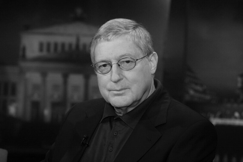 Man in glasses in studio