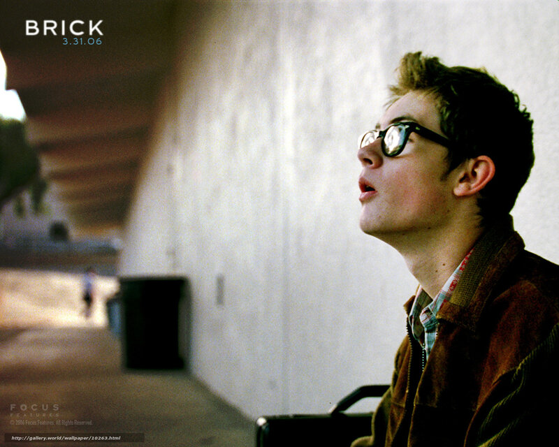 man in glasses looking up