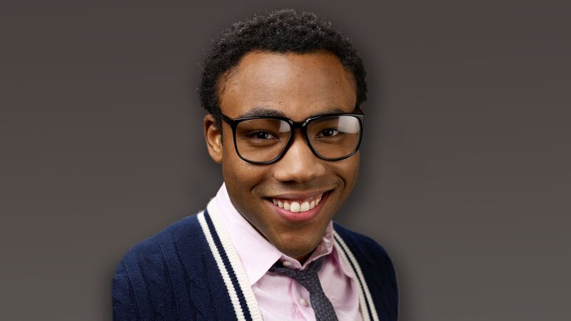 man in glasses smiling