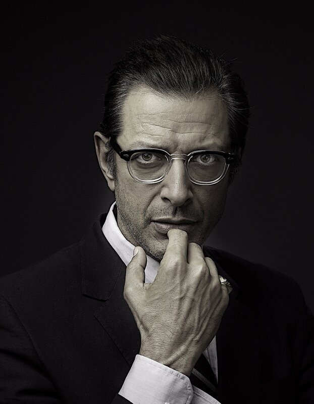 man in glasses thinking