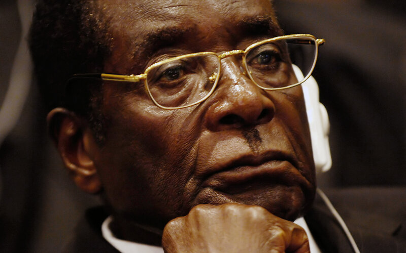 man in glasses thinking