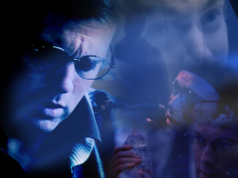 man in glasses with ghostly overlays