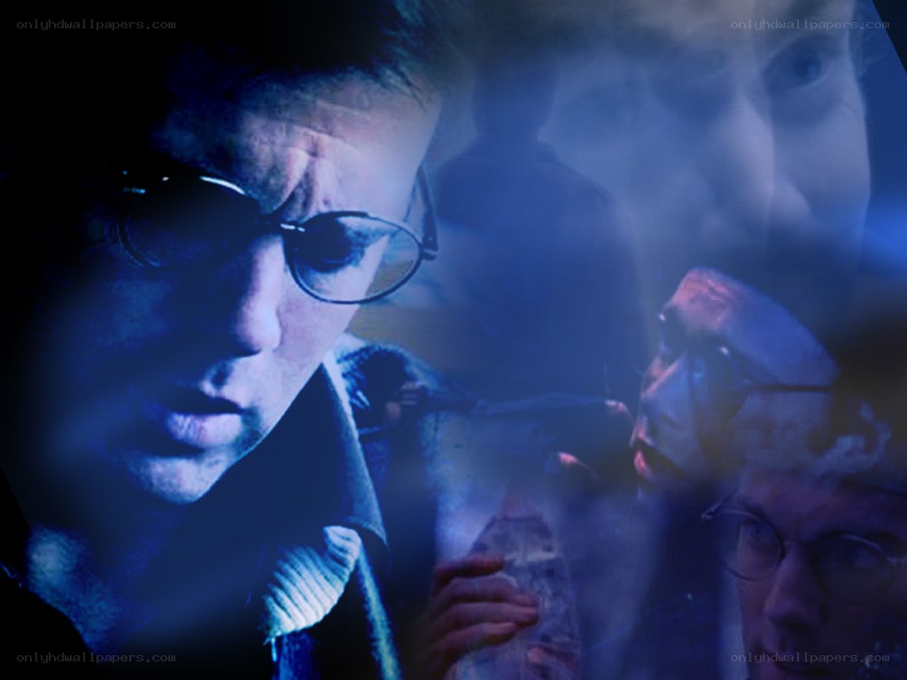 man in glasses with ghostly overlays