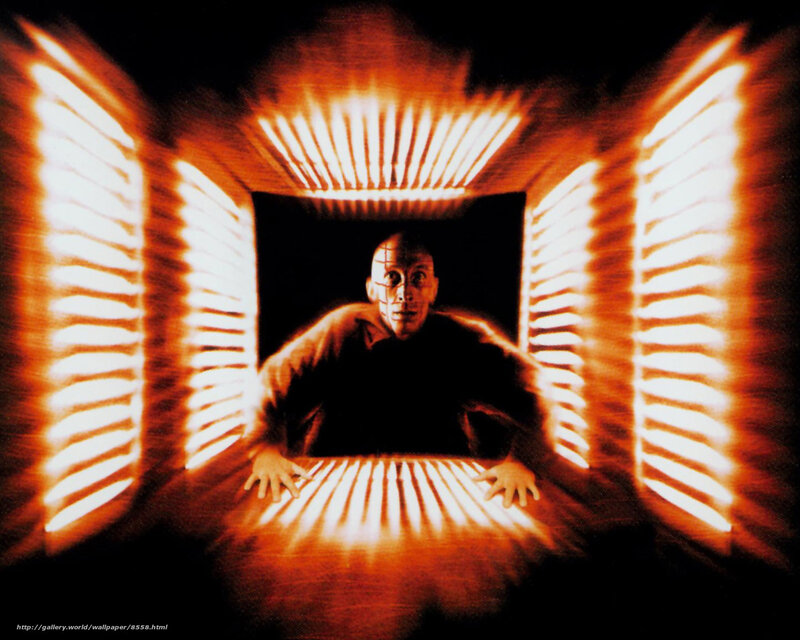 man in glowing corridor