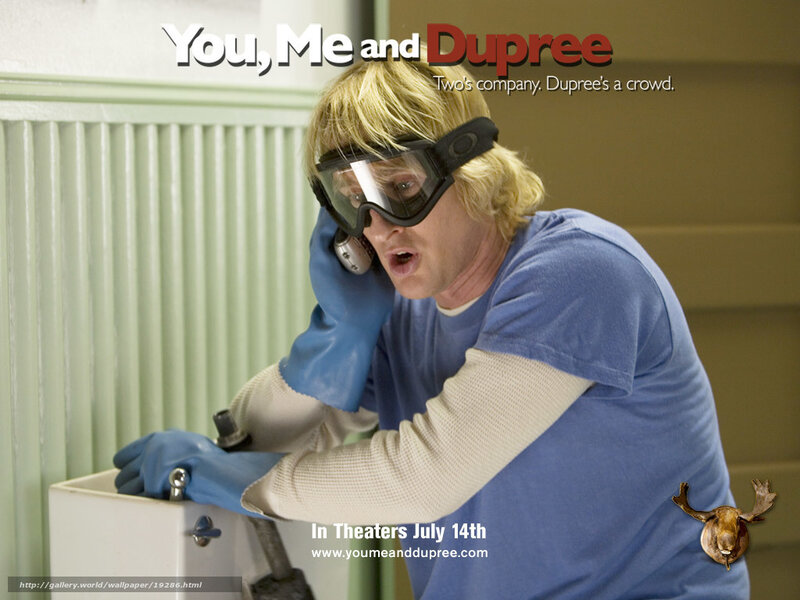 Man in Goggles on Phone
