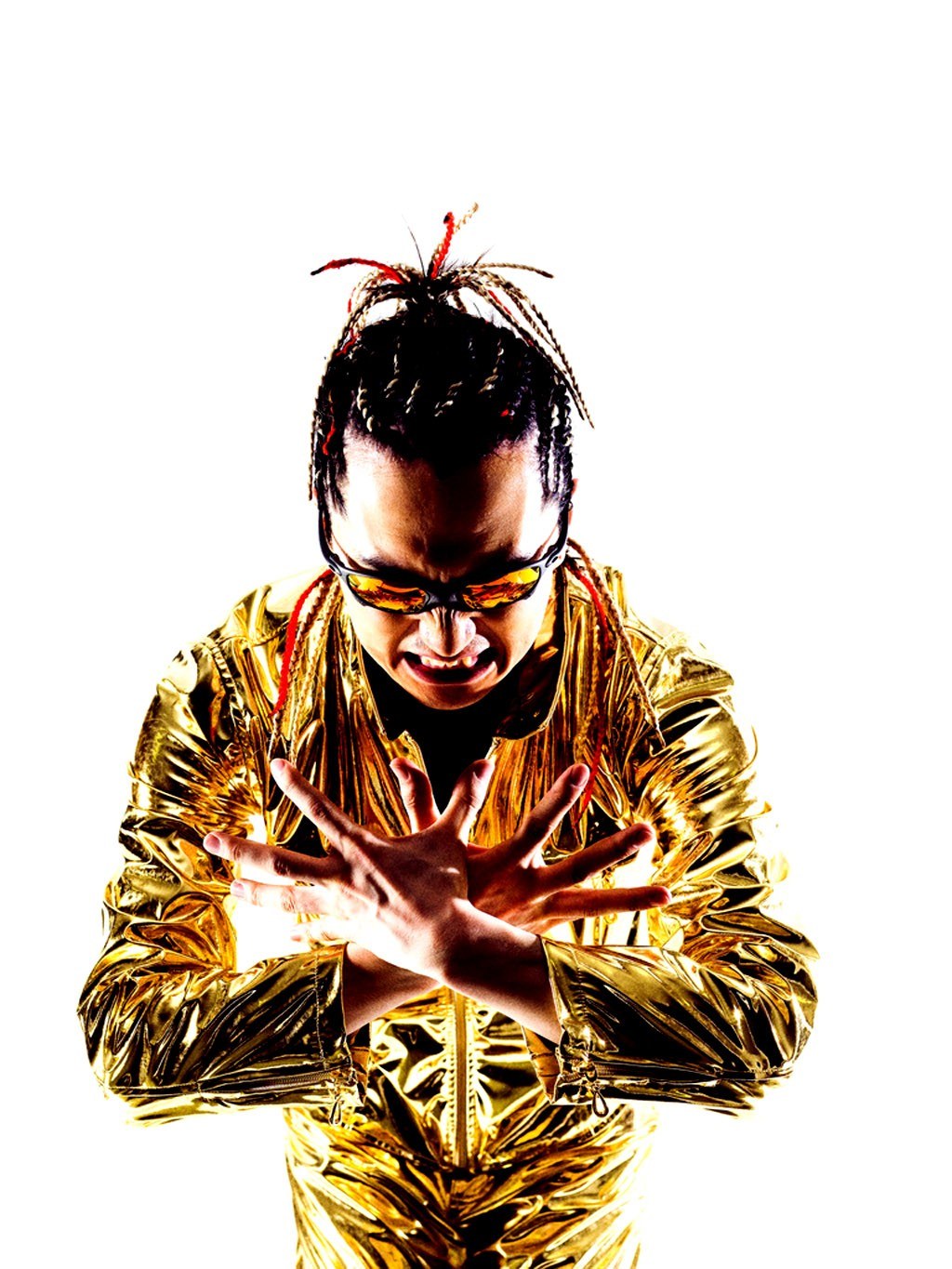 Man in gold jacket with sunglasses