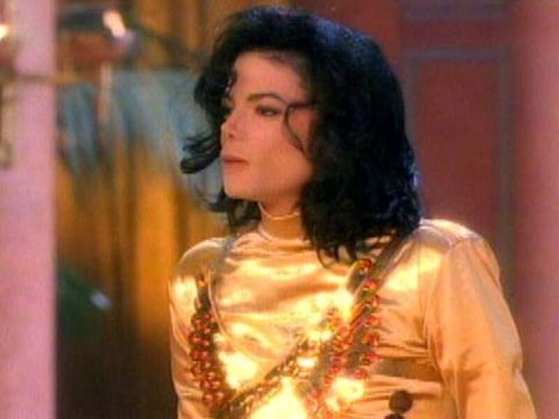 Man in Gold Outfit