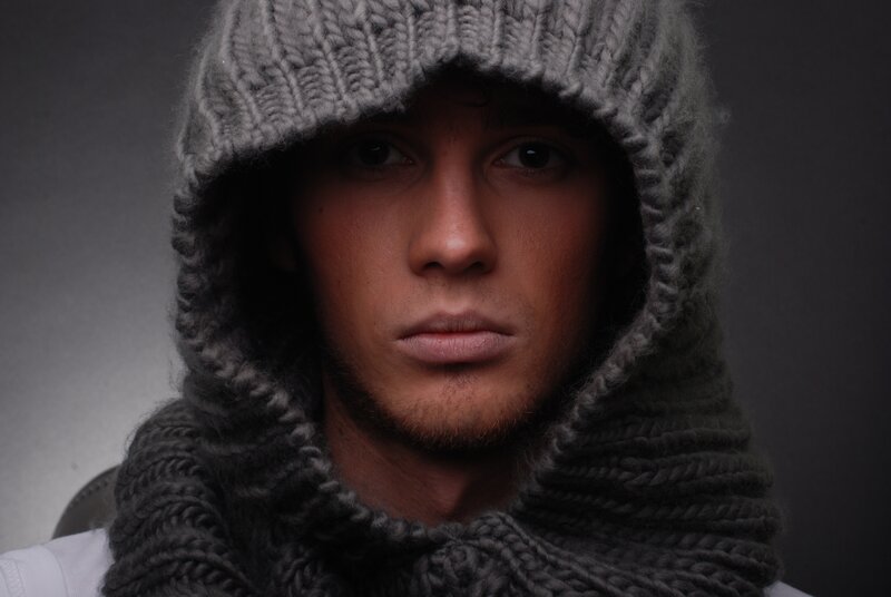 man in gray knit hood
