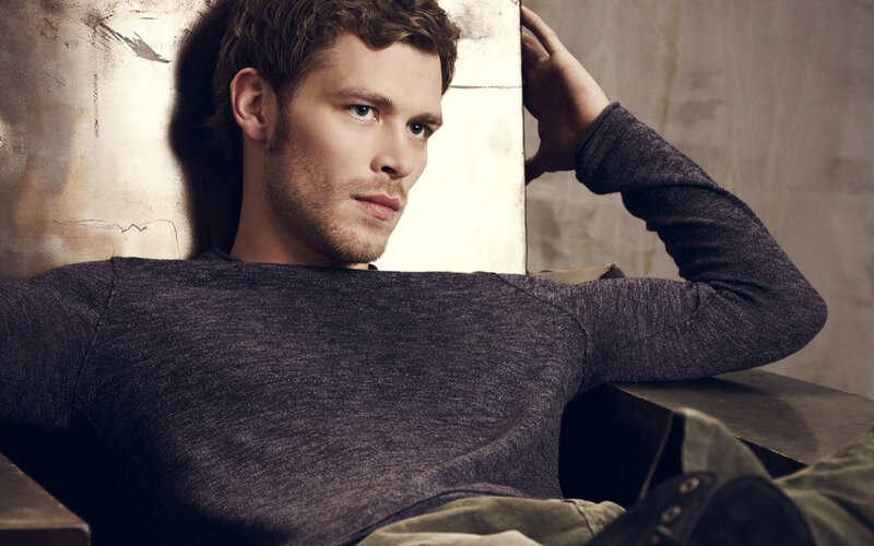 Man in Gray Sweater — Contemplative