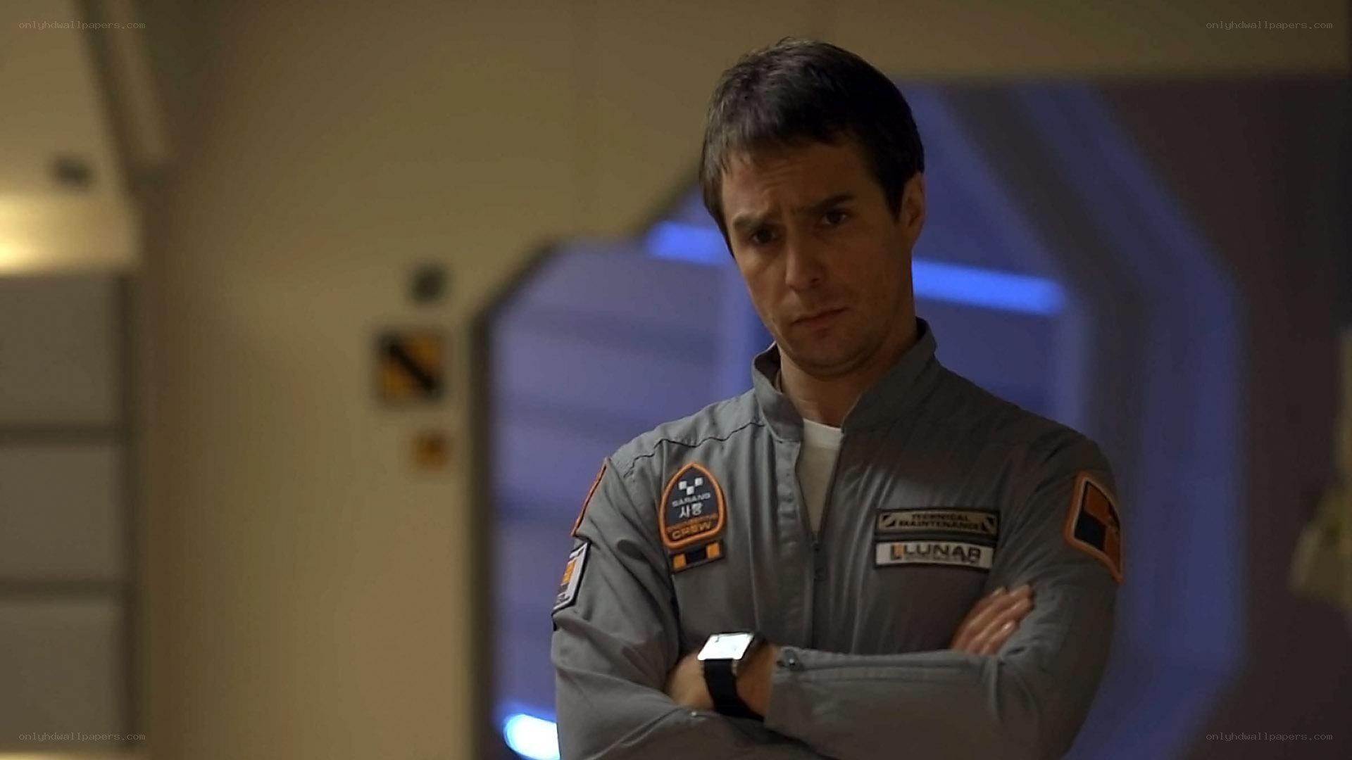 man in gray uniform standing