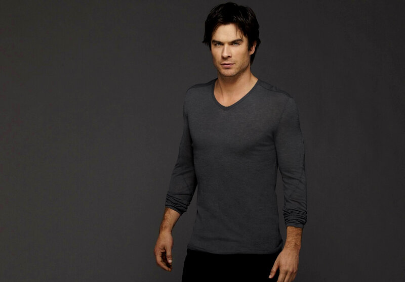 man in gray v-neck shirt