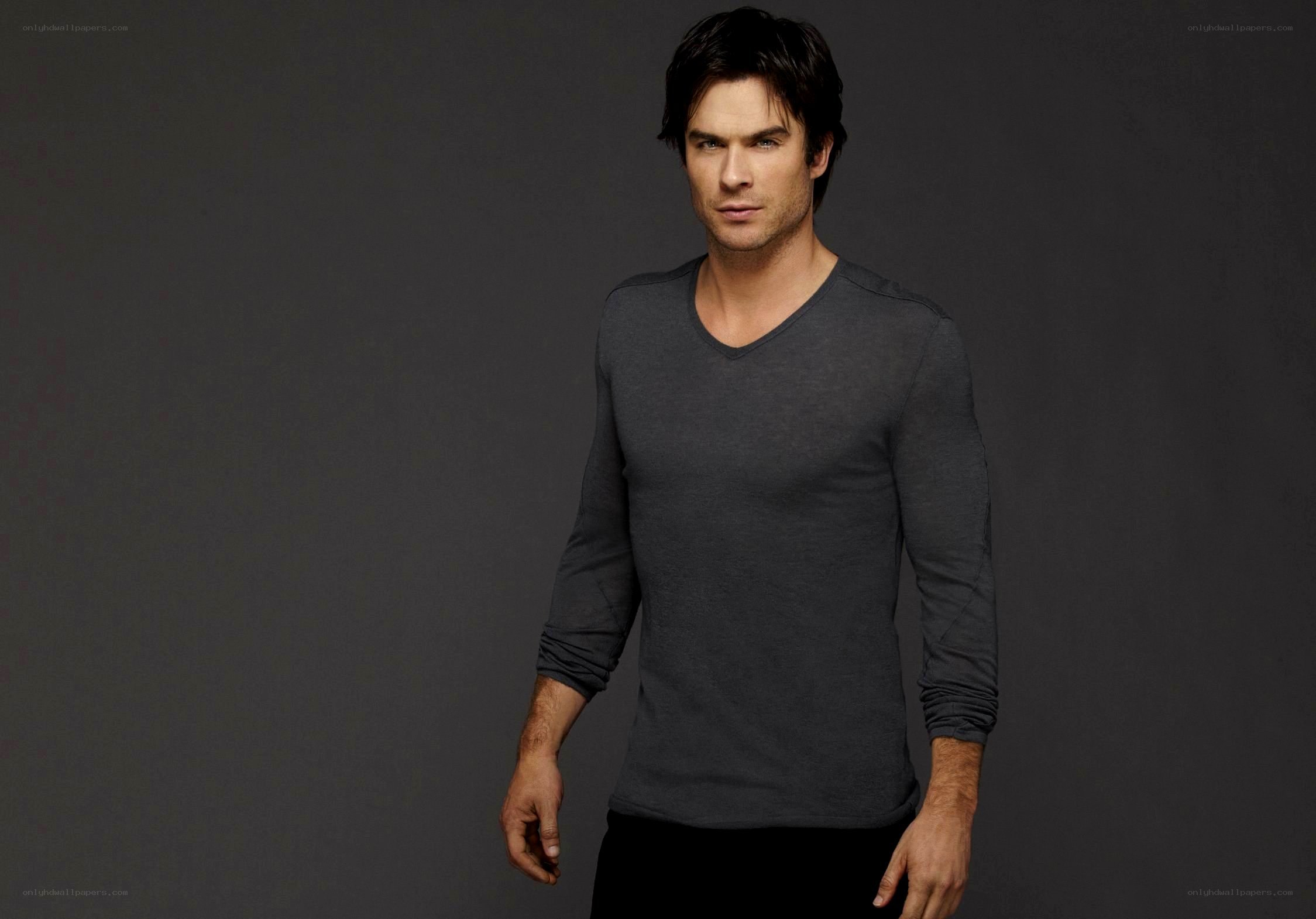 man in gray v-neck shirt