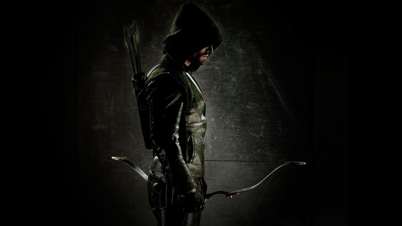 Man in Green Hooded Suit — Black, Dramatic