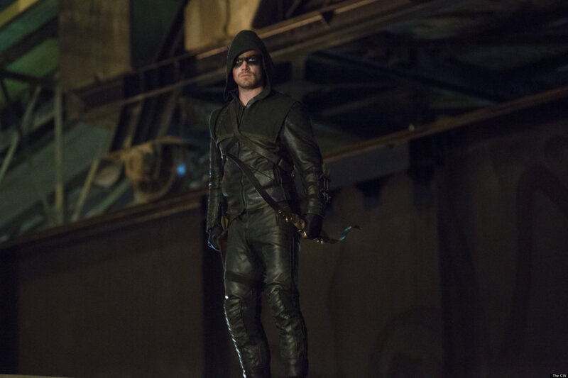 Man in Green Hooded Suit — Dramatic