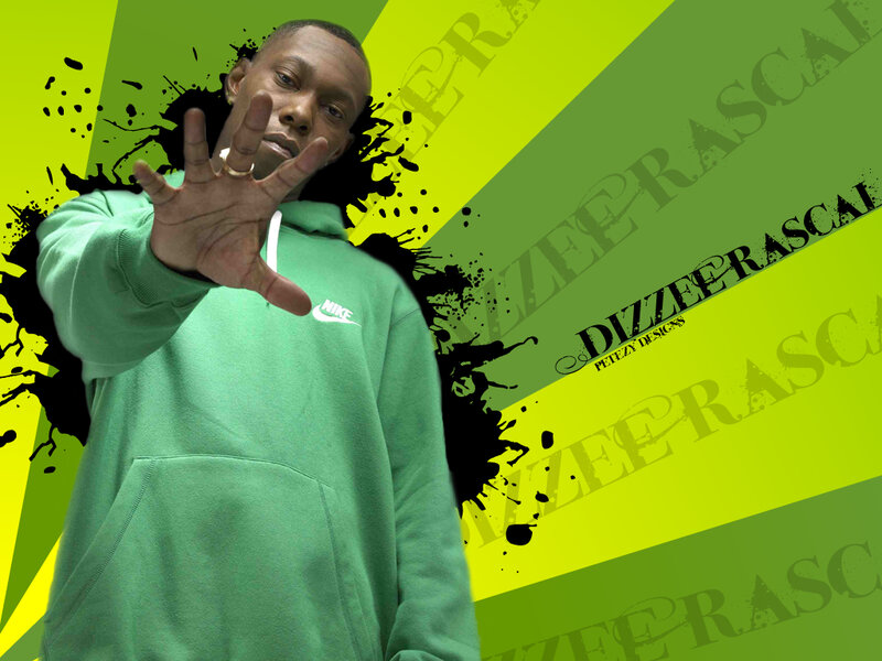 Man in green hoodie with hand gesture