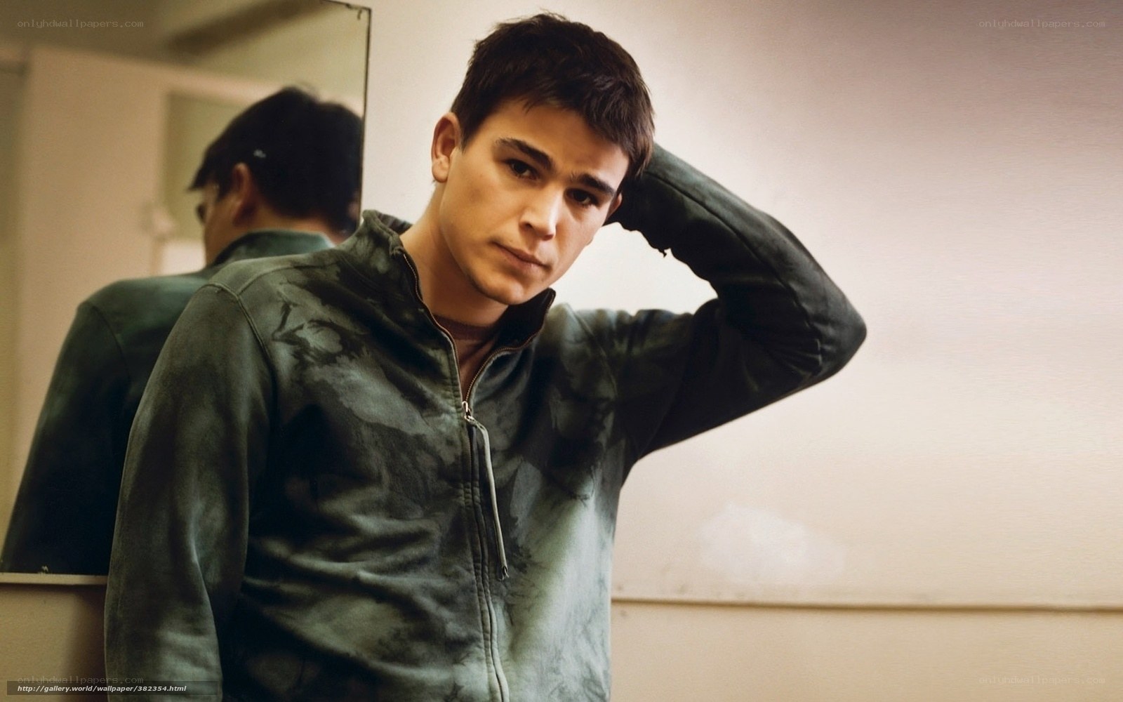 man in green jacket