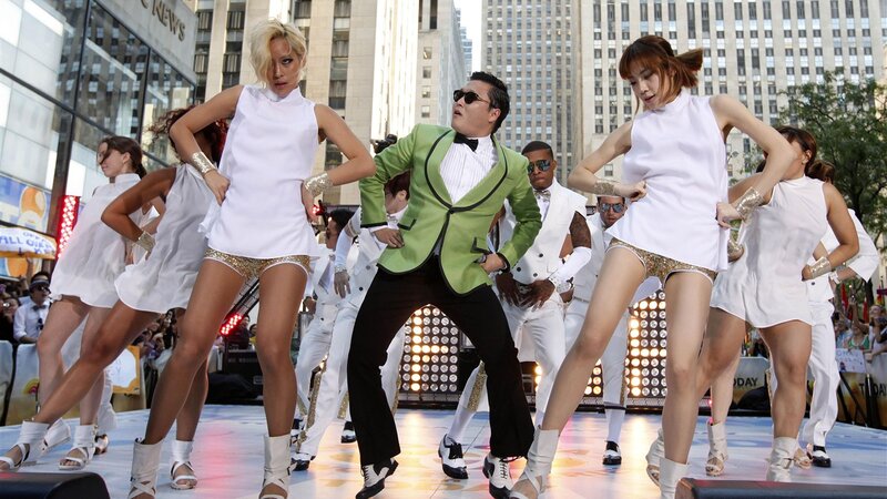 Man in Green Jacket Dancing
