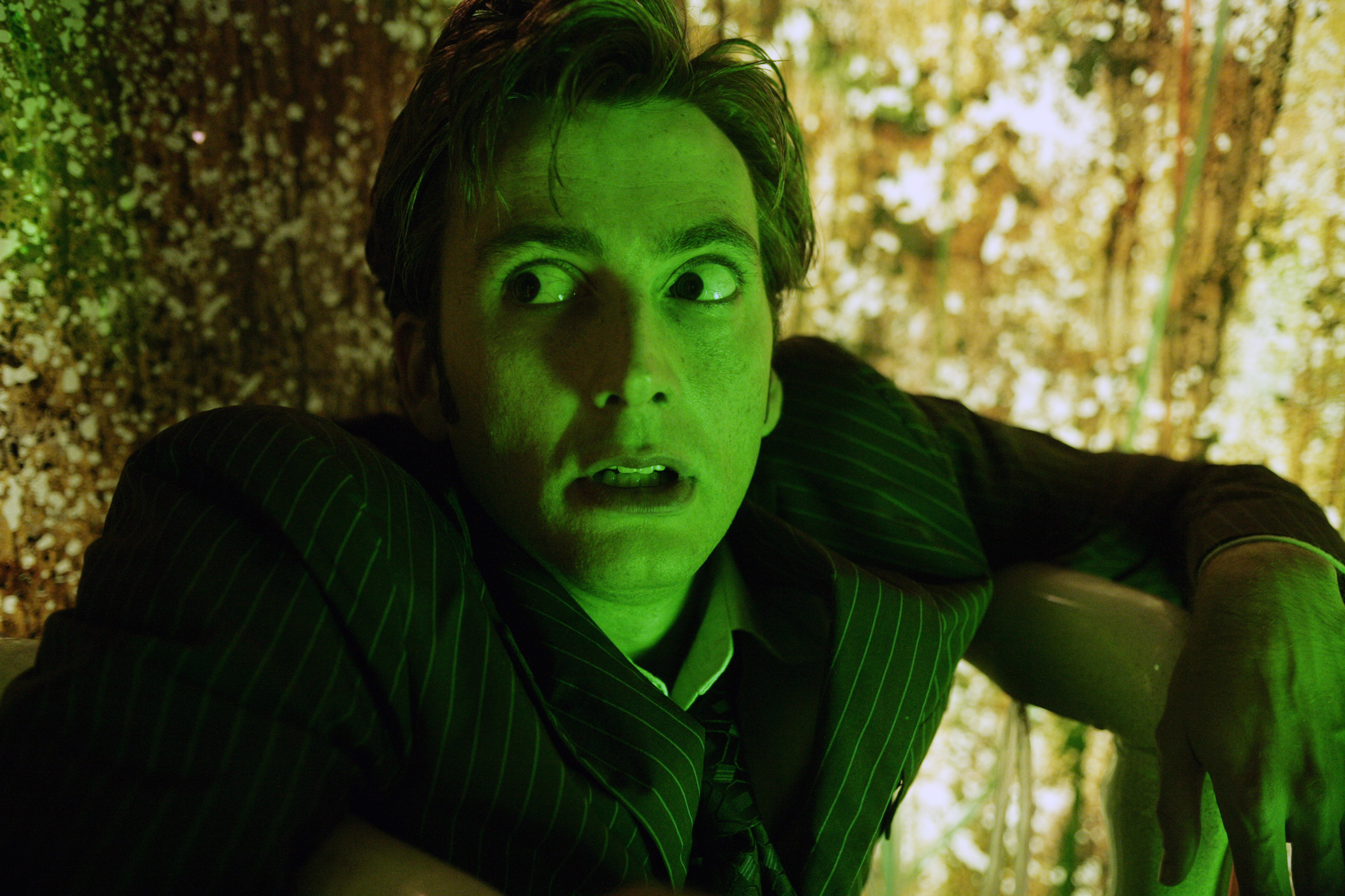 man in green light