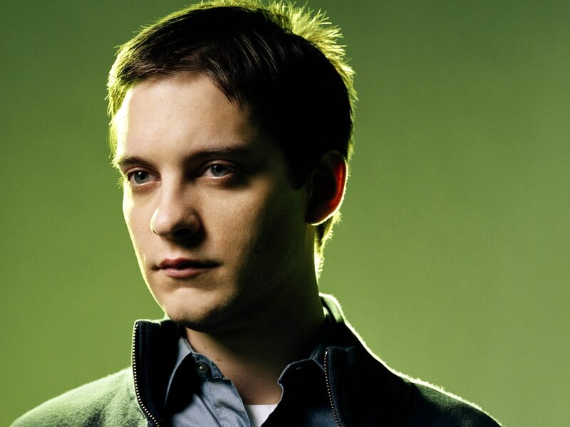 man in green-lit portrait