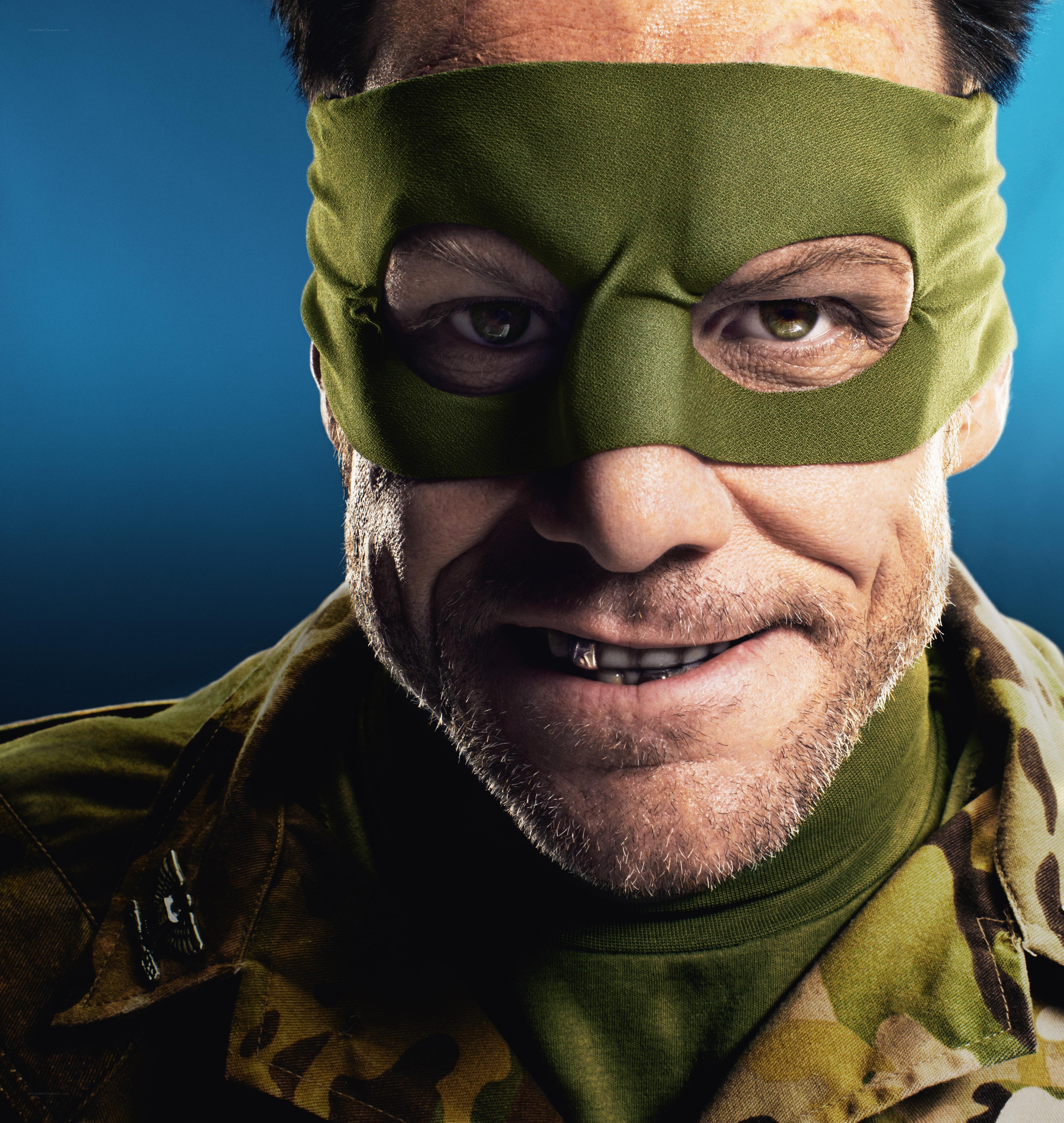 man in green mask