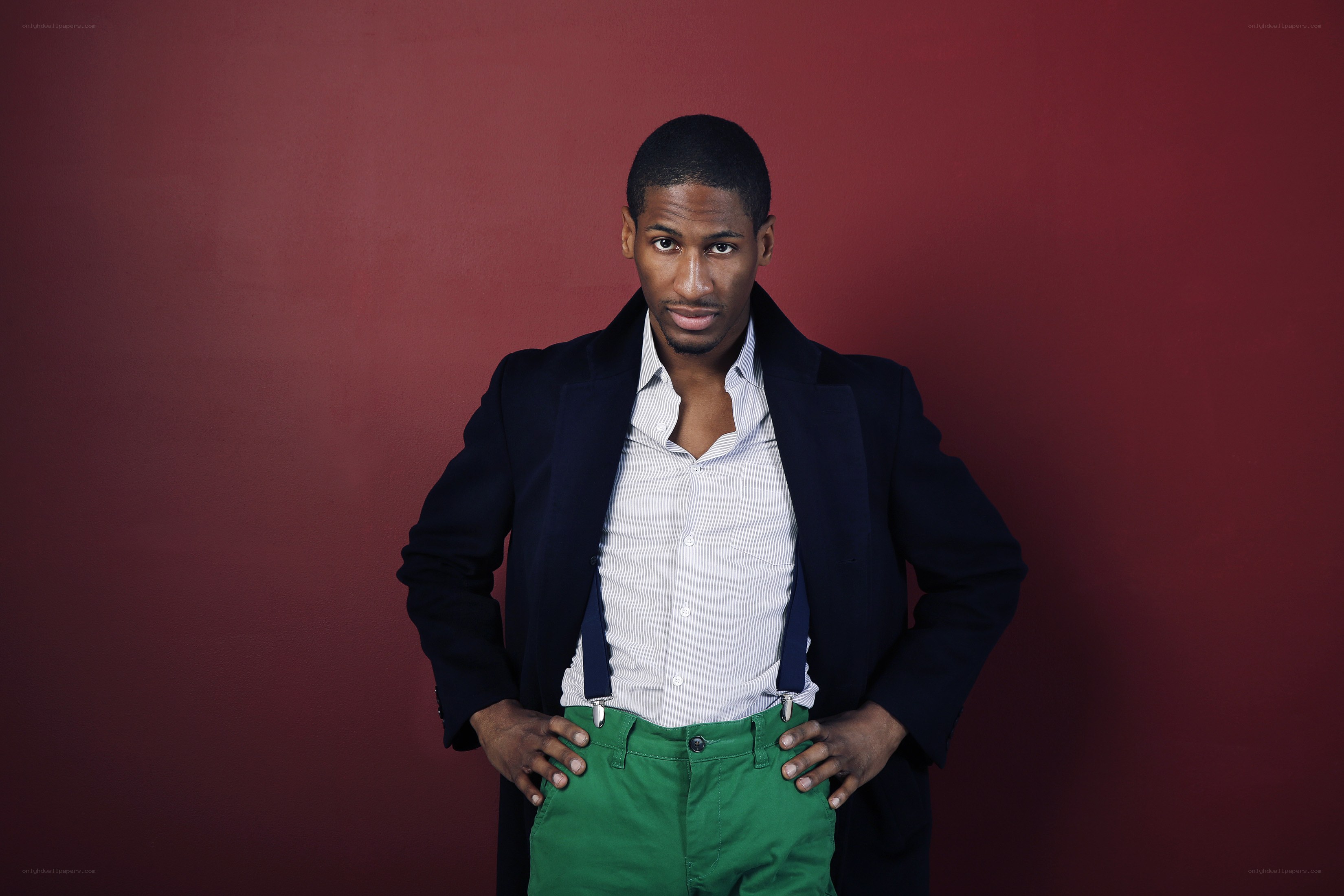 man in green pants and coat