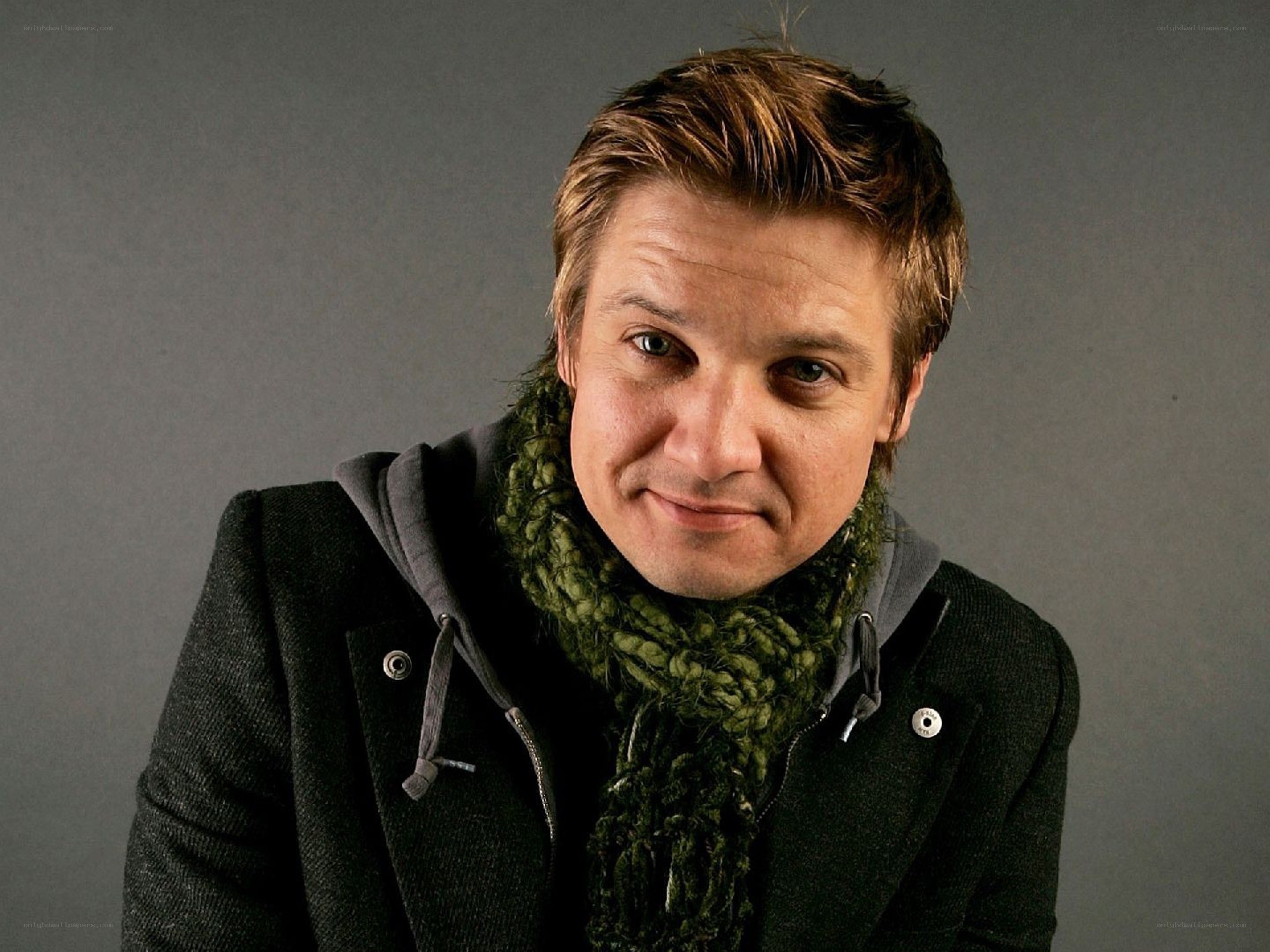 man in green scarf