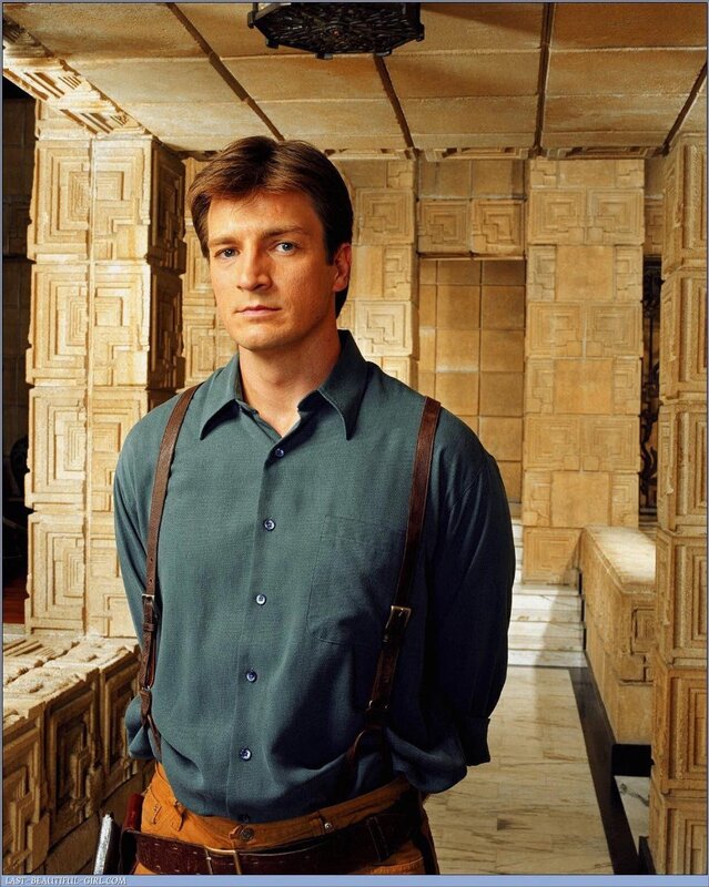 man in green shirt and suspenders
