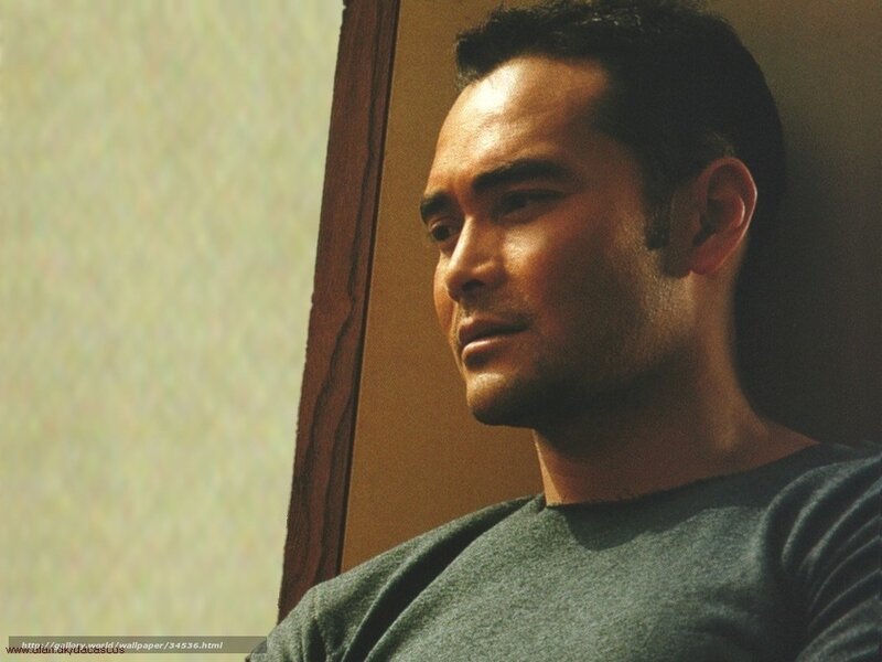 Man in Green Shirt — Contemplative