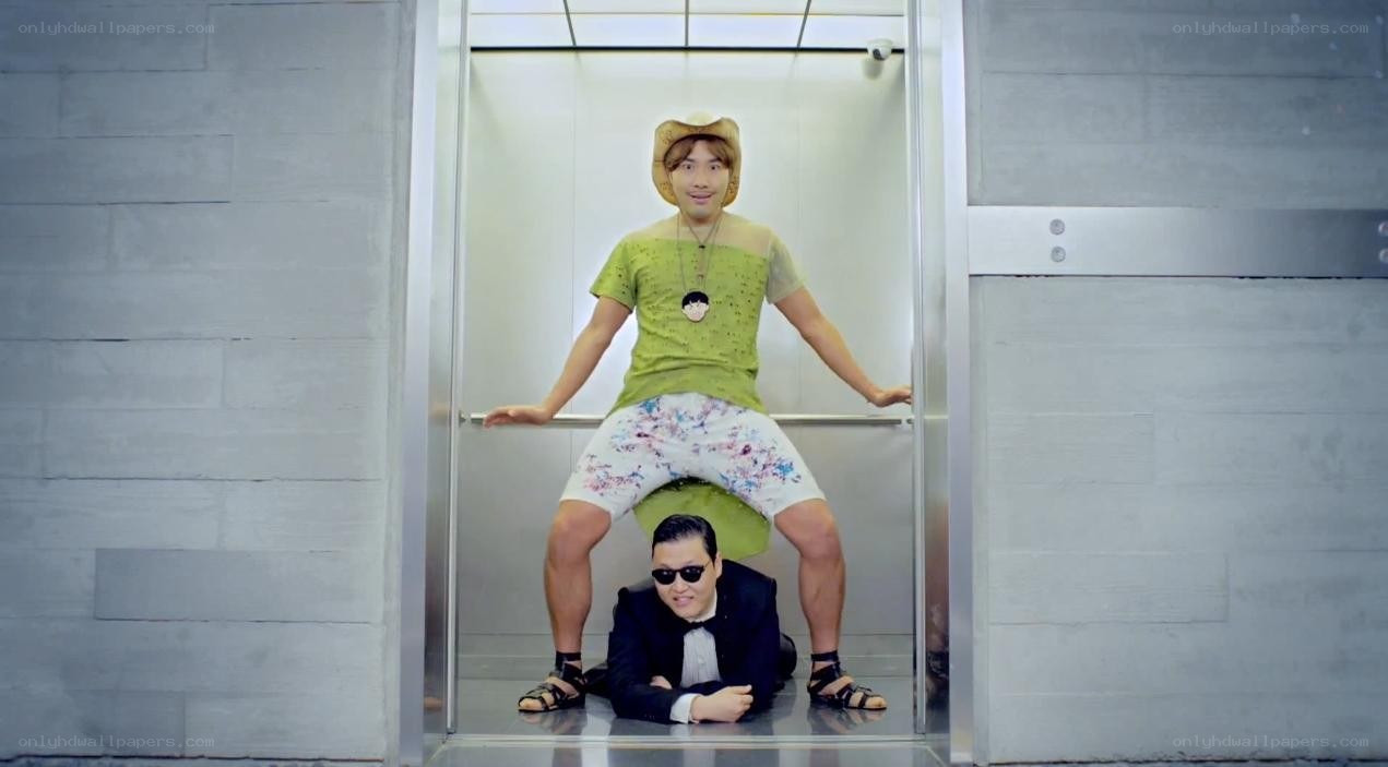 Man in green shirt in elevator