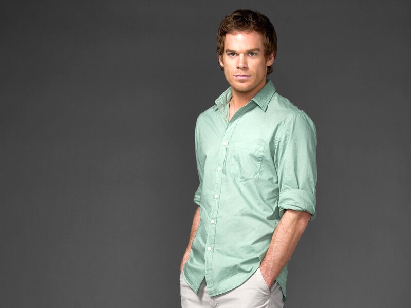 Man in Green Shirt — Neutral, Photograph, Hands in Pockets