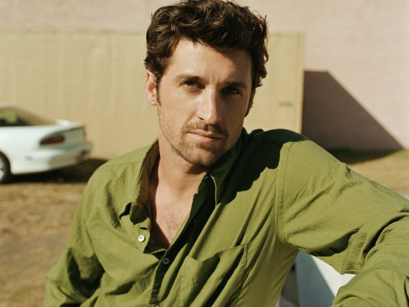 man in green shirt outdoors