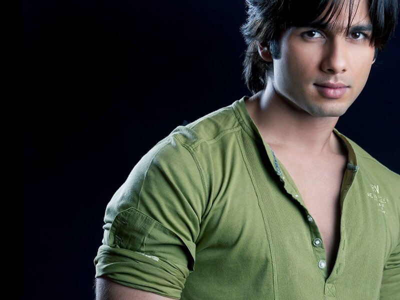 Man in Green Shirt — Serious, Photograph