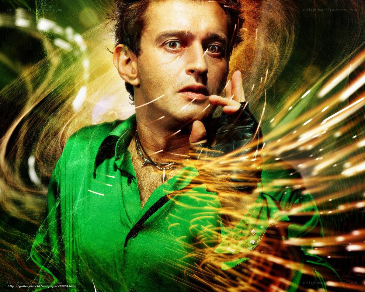Man in green shirt with light effects