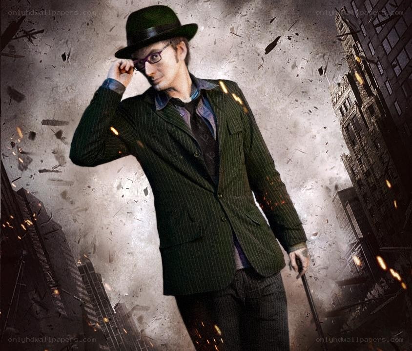 man in green suit and hat