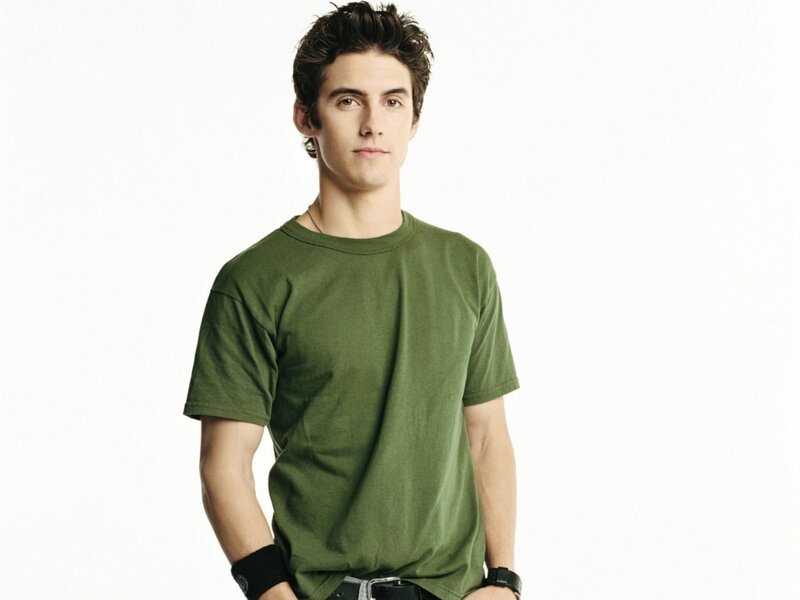 Man in Green T-shirt — Neutral, Photograph, Watch